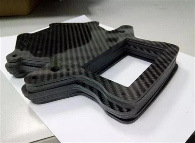 Com es fan les parts de fibra de carboni?